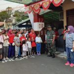 Sinergitas Babinsa Bersama Tiga Pilar Kebon Manggis Matraman Sukseskan Gerak Jalan Santai